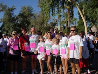 Group of runners posing at charity run