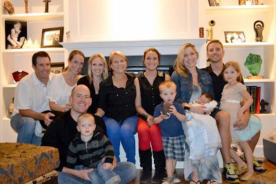 Large family group posing in living room