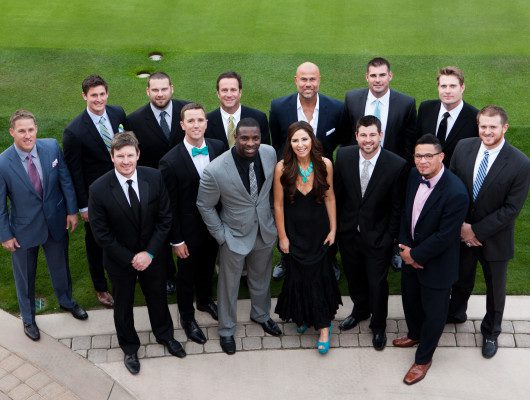 Group of people dressed in formal attire.