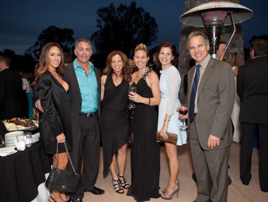 Group of people at an outdoor event.