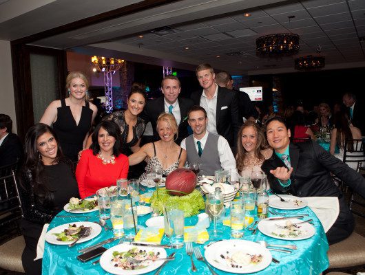 Group of people at a formal event.