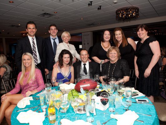 Group of people at a formal event.