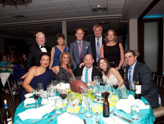 Group of people at a formal event.