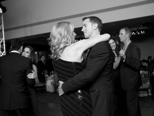 Couples dancing at a formal event.