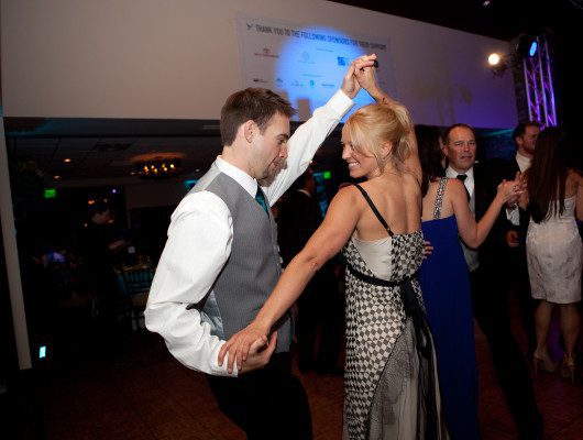 People dancing at a formal event.